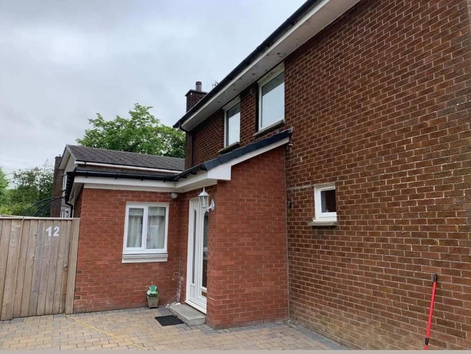 Brick to white dash with charcoal corner pillars, before we started