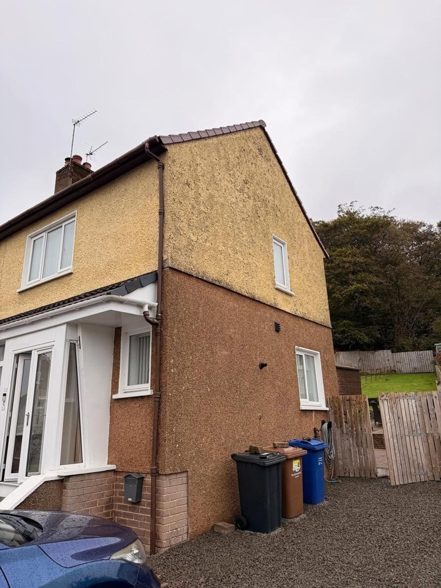 Yellow roughcast renewed in a light dry dash, before we started