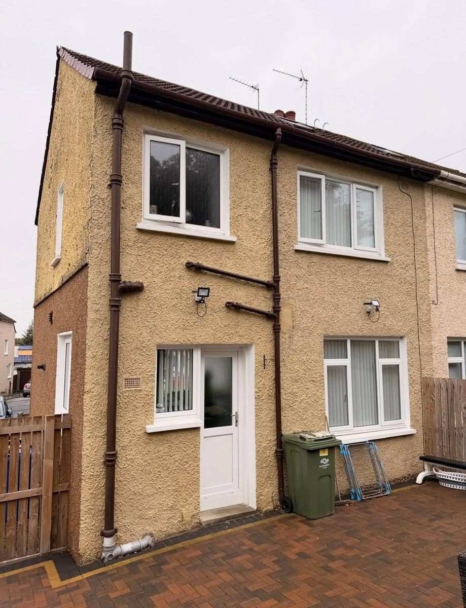 Yellow roughcast renewed in a light dry dash, before we started