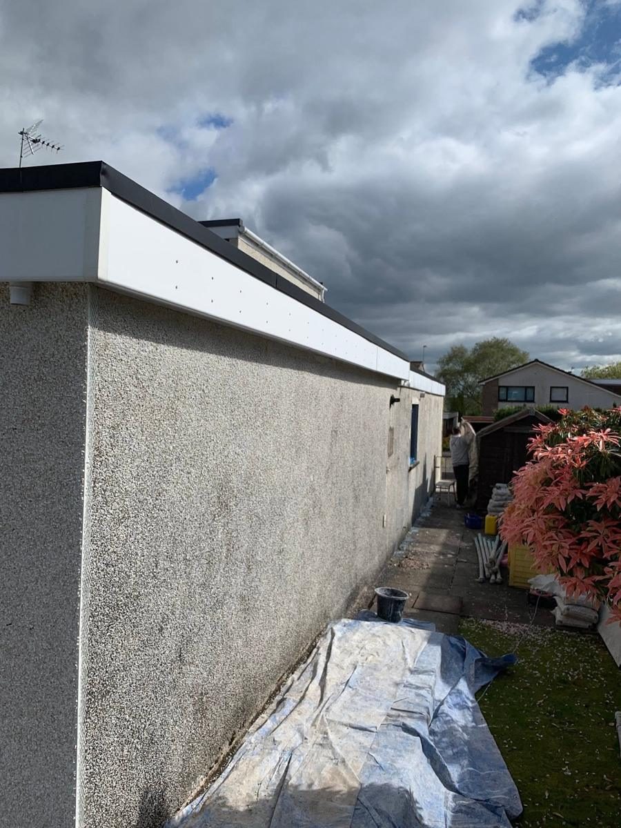 Detached house re-dashed, with a new conservatory base, finished