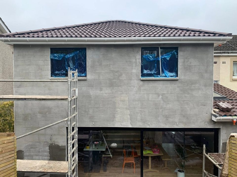 Two storey extension: blockwork, scratch coat, finished roughcast, before we started