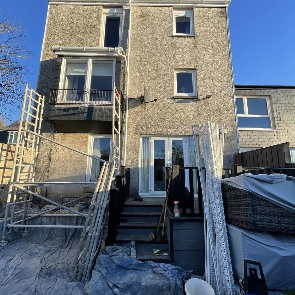 Three storey townhouse re-dashed in white, before we started