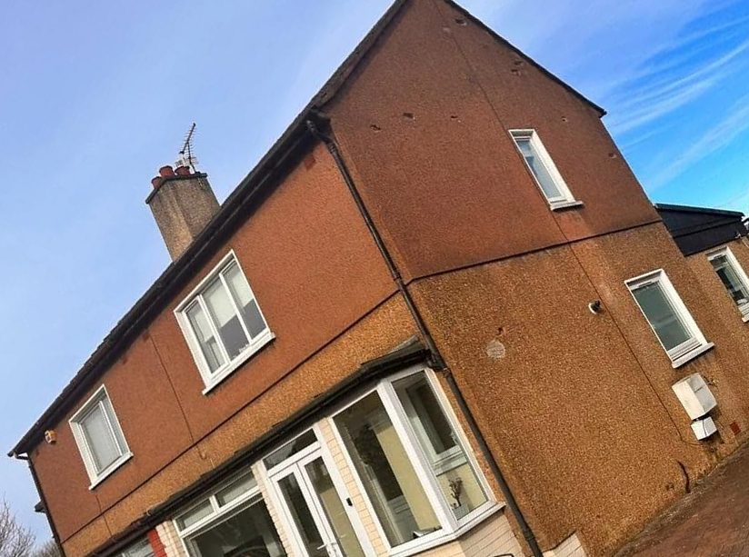 Dry dash replaced with smooth white render, before we started