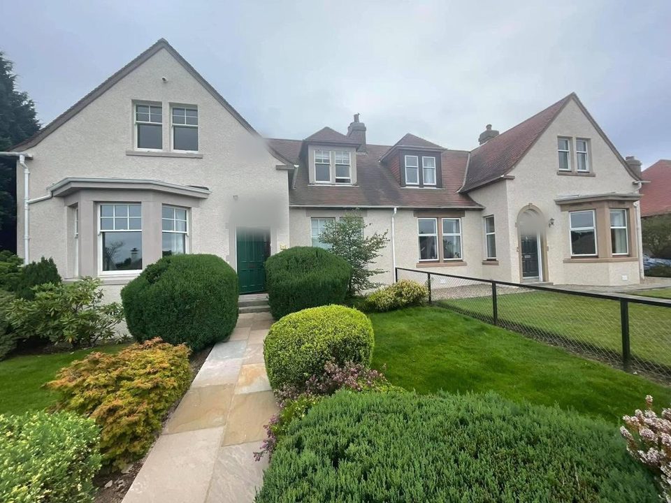Pebble dash to cream render with stone surrounds
