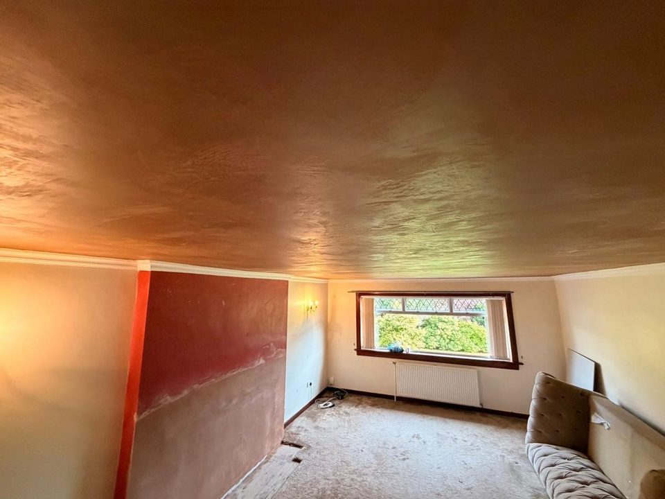 Artex ceiling and chimney breast skimmed flat, during the work