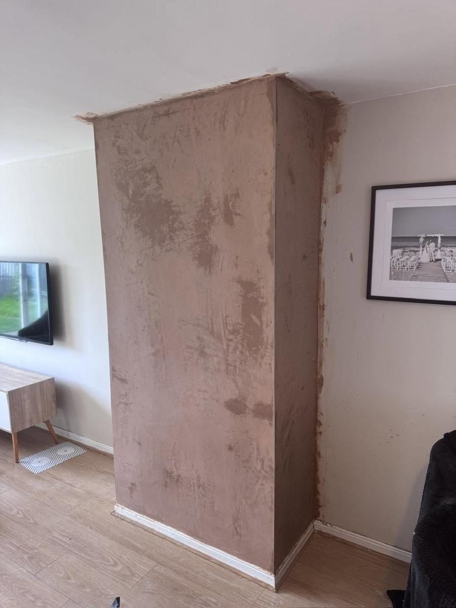 Stone effect cladding removed, chimney breast skimmed, finished