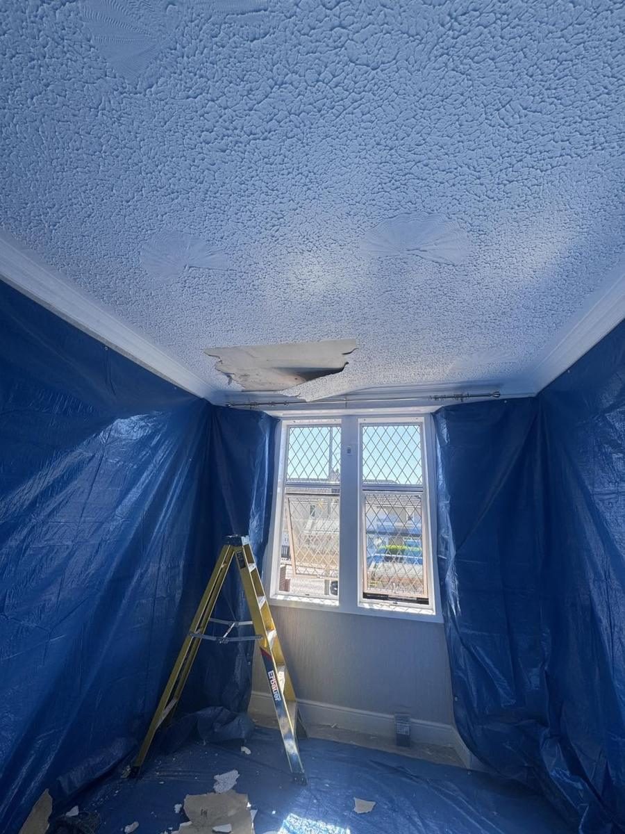 Cracked bedroom ceiling put right, before we started