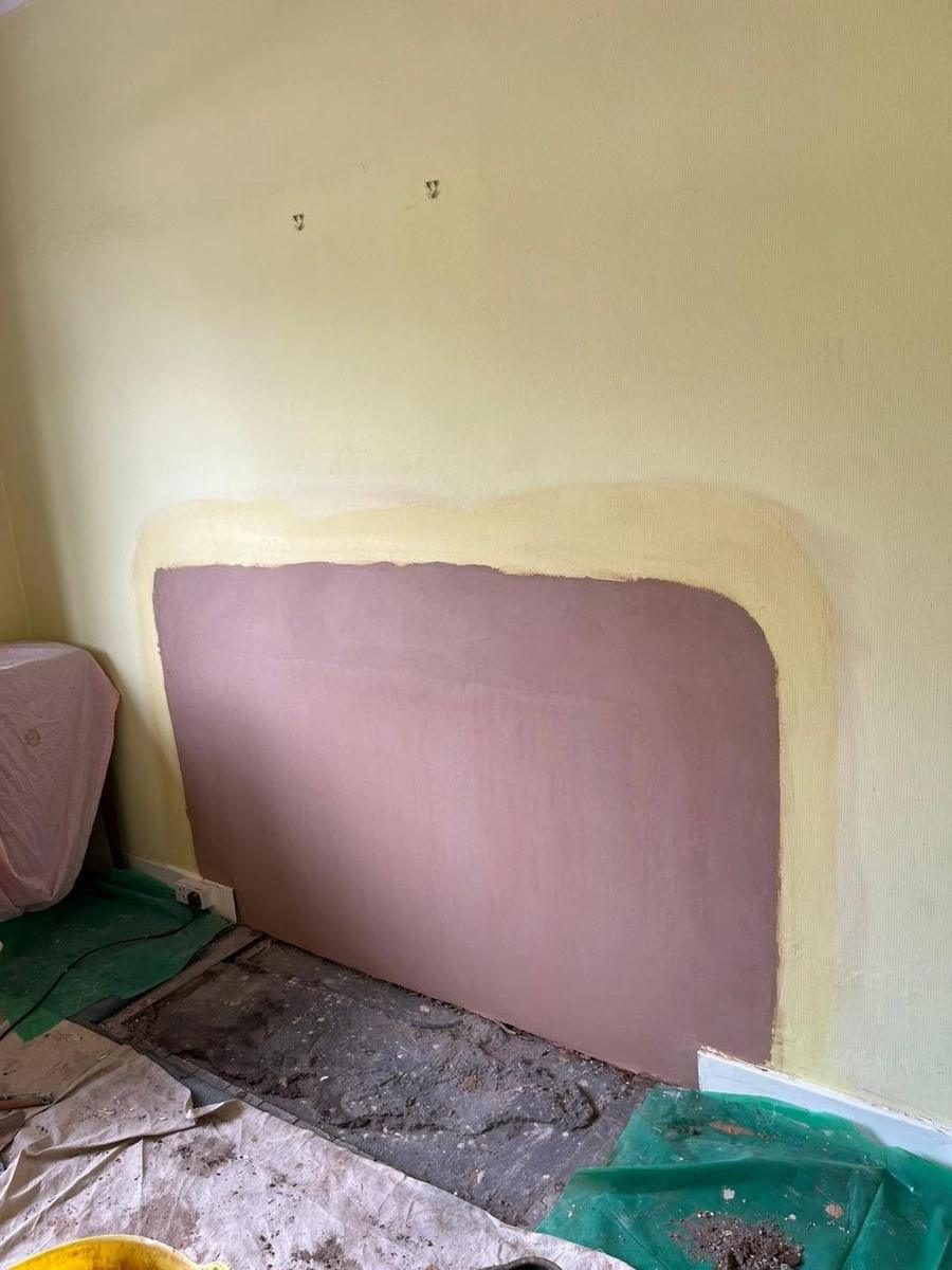 Opened chimney breast boarded and skimmed, finished
