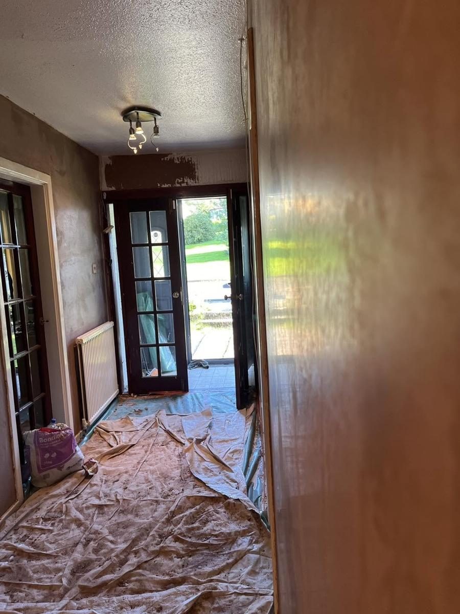 Textured hallway walls skimmed smooth, finished